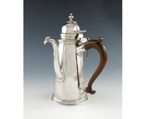 A Queen Anne silver chocolate pot, probably by Samuel Lee, London 1703, tapering circular form, scroll handles, detachable do