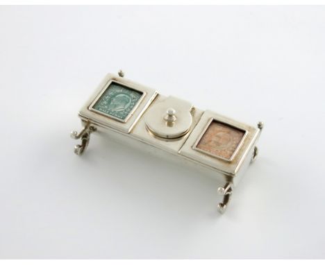 An Edwardian silver double stamp box / inkwell, by James Deakin and Sons, Chester 1901, rectangular trough form, with two hin