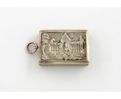 A William IV silver 'castle-top' vinaigrette, Tintern Abbey, by Edwin Jones, Birmingham 1836, rectangular form, the hinged co