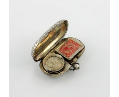 An Edwardian silver sovereign / stamp case, by William Haseler, Birmingham 1908, oblong form, engraved foliate scroll decorat