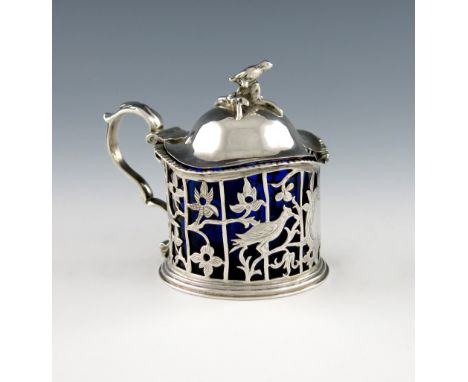 A Victorian silver mustard pot, by Charles Fox, London 1839, circular form, scroll handle, pierced and engraved with birds an