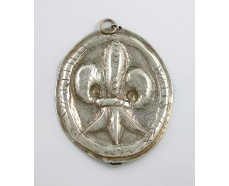 A James II silver Waits' badge, unmarked, dated 1688, oval form, the centre with the arms of Wakefield, engraved around the r