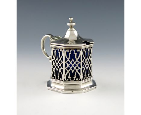 A Victorian silver mustard pot, by Hayne and Cater, London 1853, octagonal form, scroll handle, pierced with scroll decoratio
