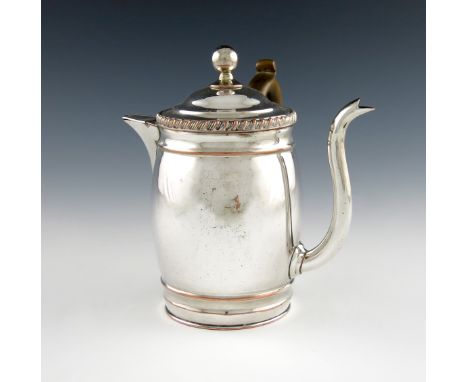 A George III old Sheffield plated Argyle, circa 1810-20, circular form, gadroon border, scroll handle, the water compartment 