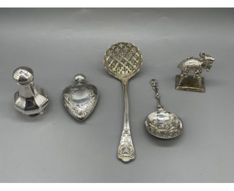 Assortment of HM Silver Items to include perfume bottle, sugar sifter and camel. Total weight 169gr