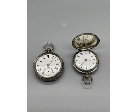 Two vintage solid silver fob watches. Glass missing from the time piece on the left. 