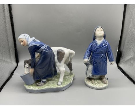 Royal Copenhagen - Girl Feeding The Cow, and Royal Copenhagen - Boy with Umbrella 
Good condition, no damage
