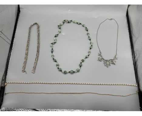 Assorted Necklaces to include Silver, Pearls with clasps and Jade &amp; Onyx 