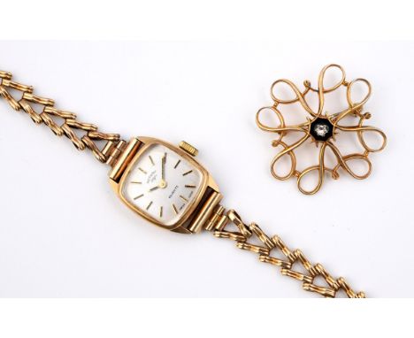 A LADY'S 9CT GOLD WRISTWATCH BY ROTARY the signed cushion-shaped dial with baton numerals, quartz movement, on a fancy link b