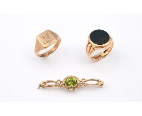 A BLOODSTONE AND 15CT GOLD SIGNET RING mounted with an oval-shaped bloodstone, 9.0 grams, size I 1/2, together with a 9ct gol