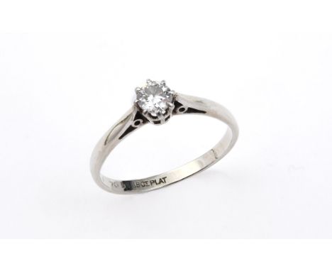 A DIAMOND SOLITAIRE RING the circular-cut diamond is set in 18ct gold and platinum. Size L