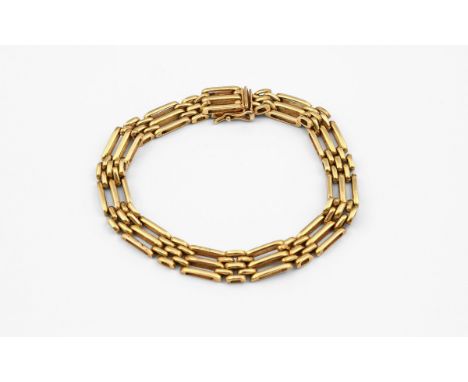 AN 18CT GOLD GATE LINK BRACELET with concealed clasp, 20cm long, 24 grams