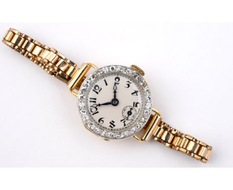 A LADY'S DIAMOND COCKTAIL WRISTWATCH the circular white enamel dial with black Arabic numerals, the bezel set with single-cut