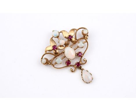 AN OPAL AND RUBY BROOCH PENDANT the foliate openwork mount set with circular and oval-shaped solid white opals and circular-c