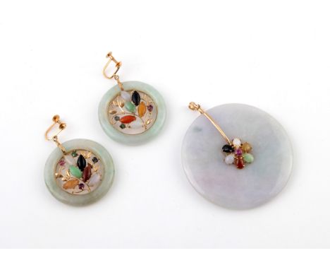 A JADE AND GEM SET PENDANT the circular jade pendant centred with a circular-cut ruby within a surround of pear-shaped assort