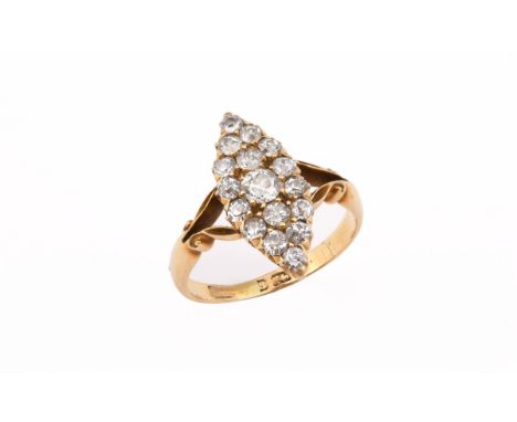 A DIAMOND MARQUISE-SHAPED CLUSTER RING mounted with graduated old-cut diamonds, in 18ct gold, with bifurcated shoulders. Size