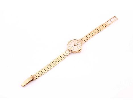 A lady's hand-wound Rolex precision with 20mm case stamped 375 with a white dial and gold baton indexes on a yellow metal bra