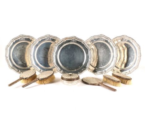 A matched set of five 18th century style silver on copper serpentine edged circular plates with cast and applied rims and eac