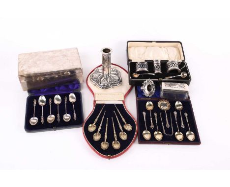 A presentation cased set of six cast silver-gilt anointing spoons, Birmingham 1936 by Elkington &amp; Co. Together with a whi