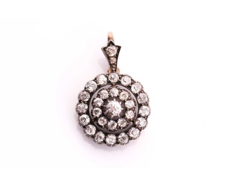 A Victorian old cut diamond target pendant, consisting of mixed round old cuts with a total estimated weight of 1.43ct claw s