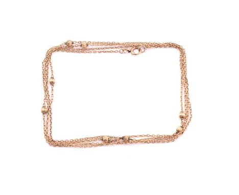 An oval belcher and ball long chain, consisting of an oval belcher link measuring 1.4mm interspace with eight-round, engraved