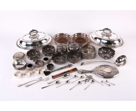 A quantity of Indian and Burmese white metal bowls, silver plated entree dishes and covers, a silver soup ladle and other sil