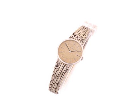 A lady's hand-wound Omega 7283 with 23mm case stamped 750 with a faded dial white metal original mesh bracelet stamped 750 an