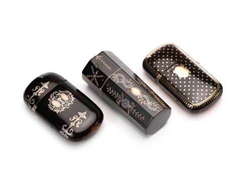 A Victorian lozenge form tortoiseshell vesta case with gold pique stars and cartouch decoration, together with another simila