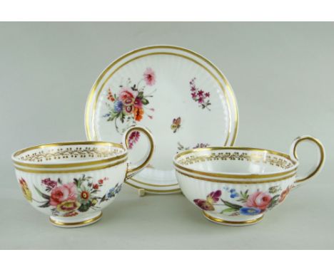 Comprising saucer, breakfast cup and teacup with conforming tapered high loop handle and Paris fluting, each element painted 
