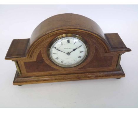 A mid-20th Century Oak Burr Walnut and Boxwood Line Inlaid Mantel Clock, retailed by Kendal &amp; Dent - London, EC, the arch