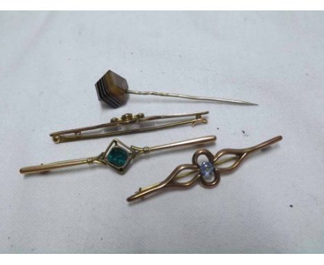 Group comprising three various Edwardian 9ct Gold bar brooches with stone set centres, each stamped 9ct, together with an Aga