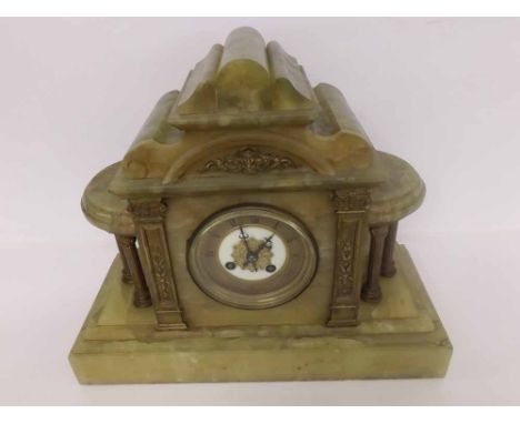 An early 20th Century Green Onyx and Gilt Metal Mounted Mantel Clock, the architectural case with stepped and shaped pediment