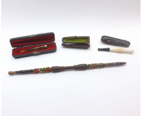 A Mixed Lot comprising: various vintage Cheroot Holders, some cased, and further Pipe with beaded decoration, largest piece 1