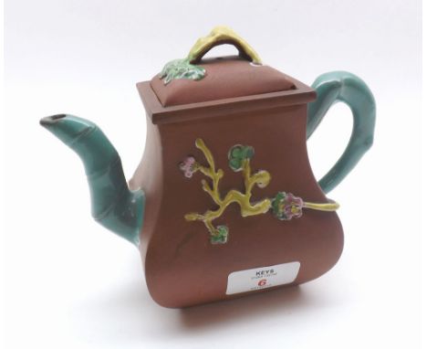 Small 20th Century Chinese clay Teapot decorated with foliate detail, impressed marks to base, 5 1/2" high 