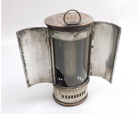 A 19th Century Silver Plate on Copper Travelling Candle Lantern with double doors and interior glazing (damaged), 6" high, no