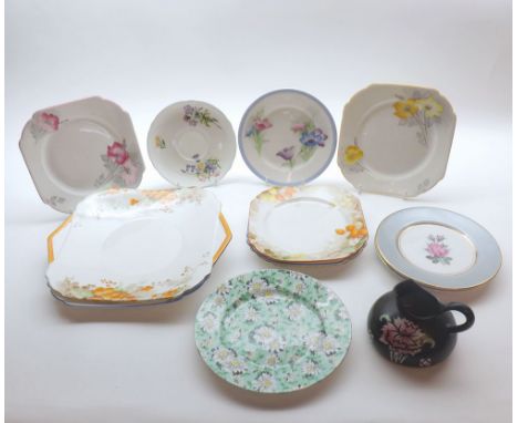 A Mixed Lot of Shelley Table Wares comprising: two double-handled Sandwich Plates, ten Saucers and a small Squat Jug, varying