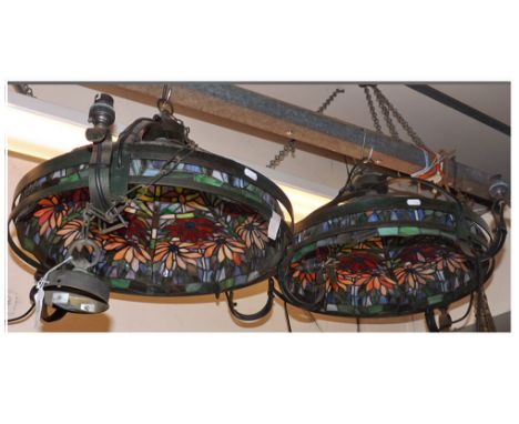 Pair of modern four-light Tiffany style ceiling light fittings, decorated with abstract floral design, 19" diameter  50-70