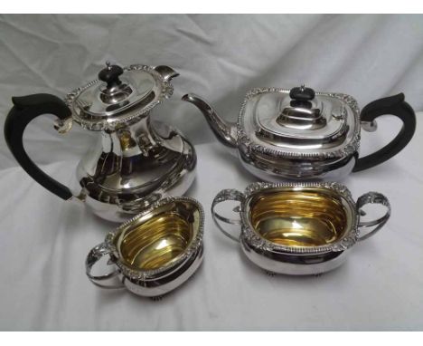 Good quality Queen Elizabeth II four-piece Tea Service comprising Tea Pot, Hot Water Jug, Milk Jug, and double handled Sugar 