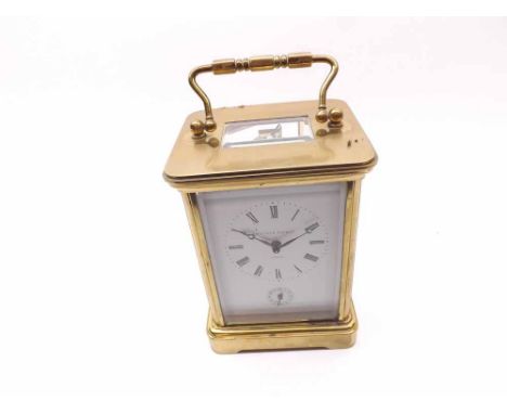A late 20th Century Swiss Lacquered Brass Carriage Alarm Clock, Matthew Norman - London, the lever platform escapement with s