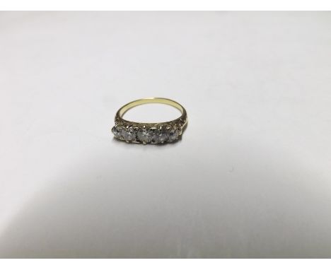 Early/mid-20th Century unmarked yellow metal Ring, the carved boat shaped setting featuring five old cut Diamonds, the centre