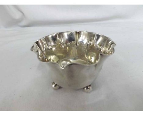 An Edward VII Silver Sugar Basin of frilled circular form, raised on four small bun feet, hallmarked London 1903, weight 2 1/