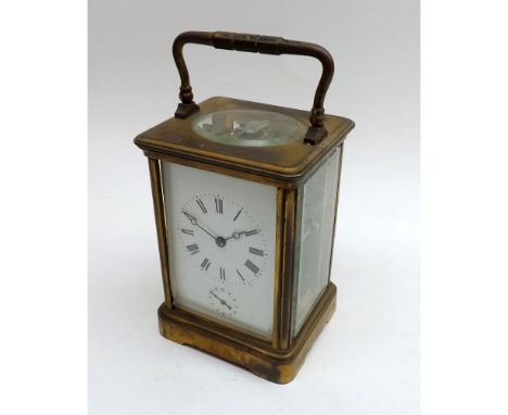 A late 19th Century French gilt Brass Carriage Alarm Clock, Margane 6927, the silvered lever platform escapement with bi-meta