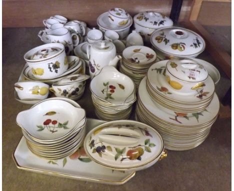 An extensive collection of Royal Worcester Evesham Table Wares to include: Covered Vegetable Dishes, Gravy Boat, Flan Dishes,