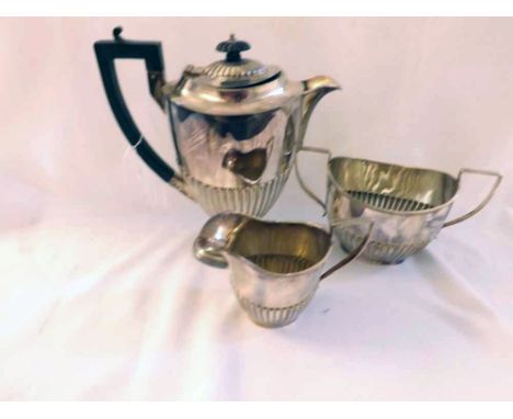 A late 19th or early 20th Century Four Piece Silver Plated Tea Set, comprising teapot, hot water jug, milk jug and sugar basi