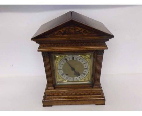 An early 20th Century Oak Cased Mantel Clock, Winterhalder & Hofmeier, the architectural case with Palladian pediment over br