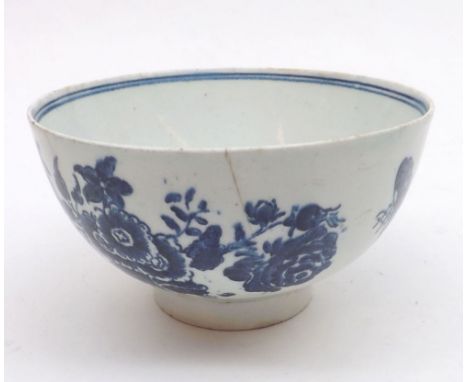 An 18th Century English Sugar Bowl painted in underglaze blue with butterflies and floral sprigs with a plain double lined in