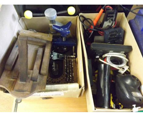 A Mixed Lot comprising: two boxes of various Clock and Watch Making Tools, including demagnetisers, battery testers, case cla