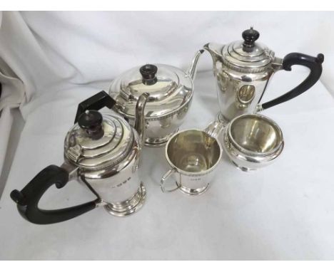 A mid-20th Century Five Piece Silver Tea and Coffee Service, comprising Teapot, Coffee Pot, Hot Water Jug, Sugar Basin and Mi