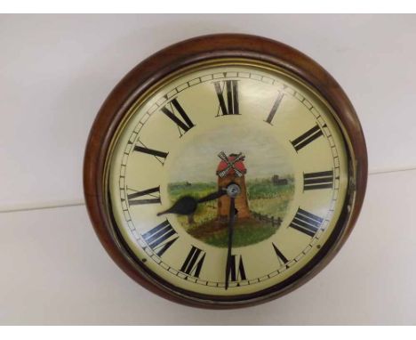 An early 20th Century Mahogany Cased Dial Timepiece, the plain moulded surround to a spun brass bezel (lacking glass), to a r