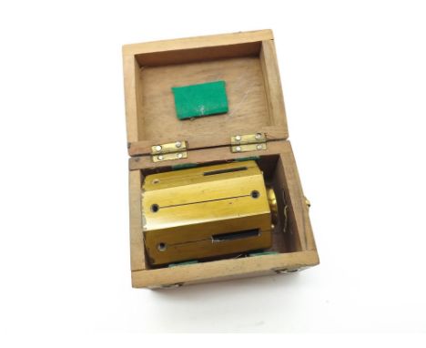 Mixed lot comprising a lacquered Brass Surveyors Cross-Head, together with a Mahogany cased Director No 1 W Ottway & Co Ltd, 